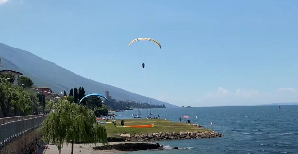 Landing zone conditions showing wind effects and landing field characteristics at Lake Garda