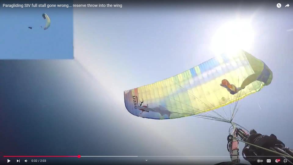 Reserve caught by wing during entanglement scenario showing deployment failure with slow opening